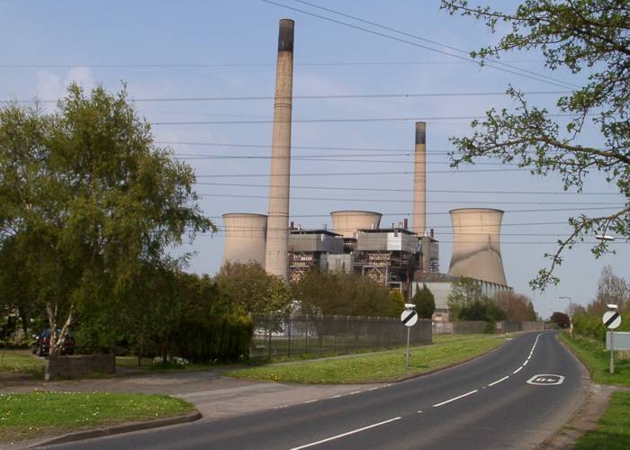 A view looking east along the A5132 Twyford Road at the edge of the village, dominated by the power station.