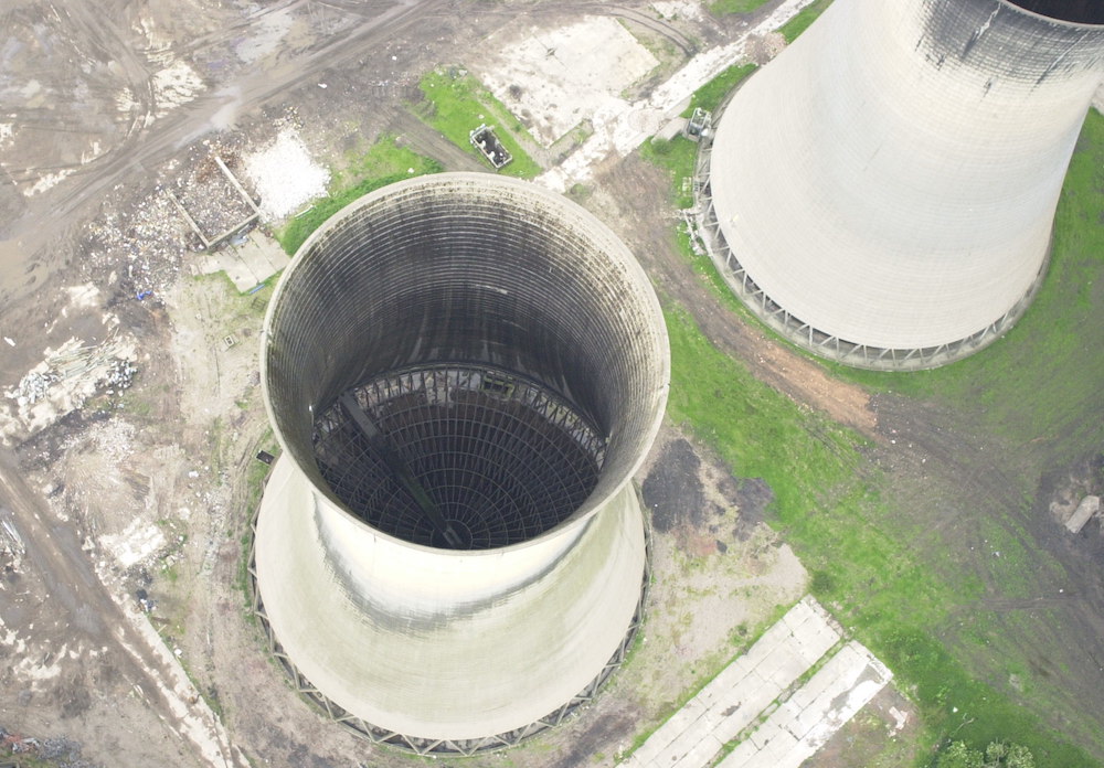 An aerial view looking down into a cooling tower.