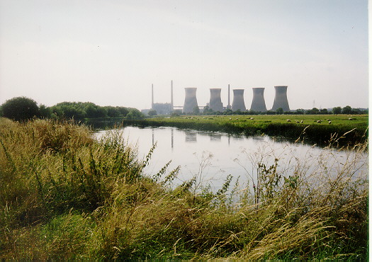 A view looking across the River Trent with the cooling towers of Willington dominating the skyline in the distance